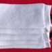 Maxi-5pc-knitted-makeup-remover-glove-on-ziplock-bag